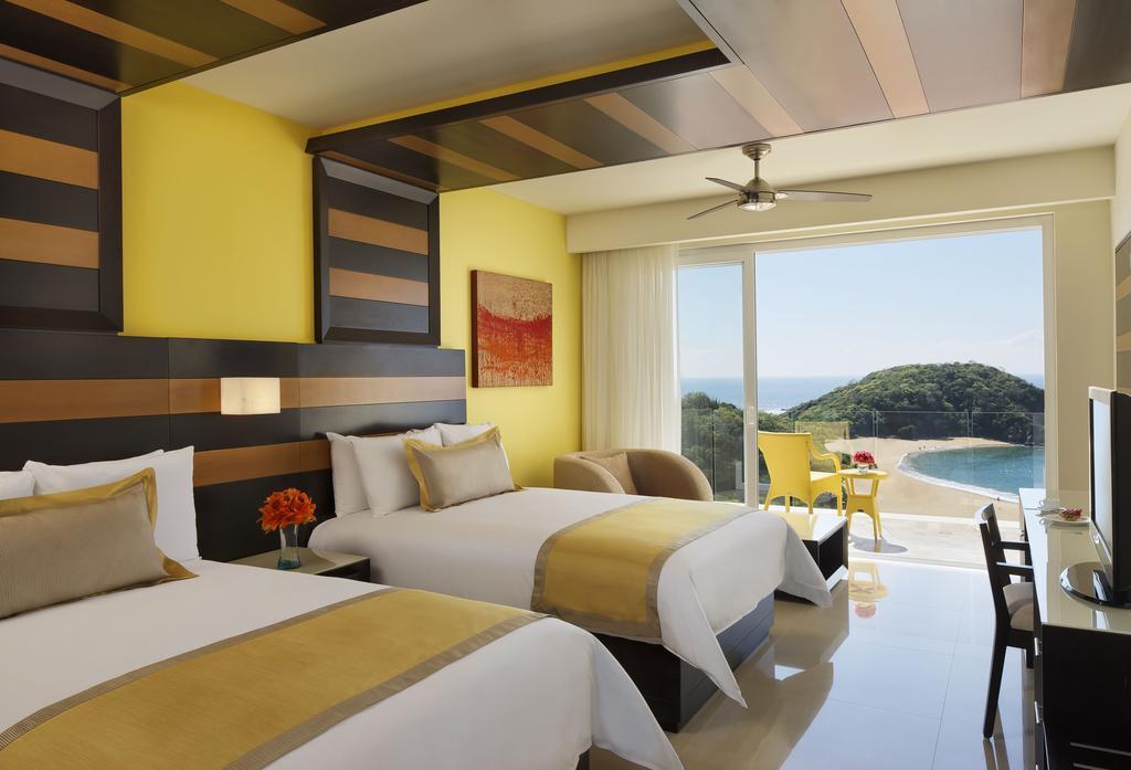 Suite Junior Preferred Club - 2 camas dobles - Primera línea de playa